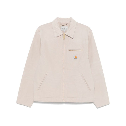 CARHARTT WIP MAIN Jackets Beige, sand canvas jacket with zip fastening, chest pocket, and jetted pockets, size M shown.