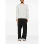 C.P. COMPANY Sweaters Clear Blue crew neck with patch pocket, ribbed cuffs, worn by model, ice blue color, cotton material
