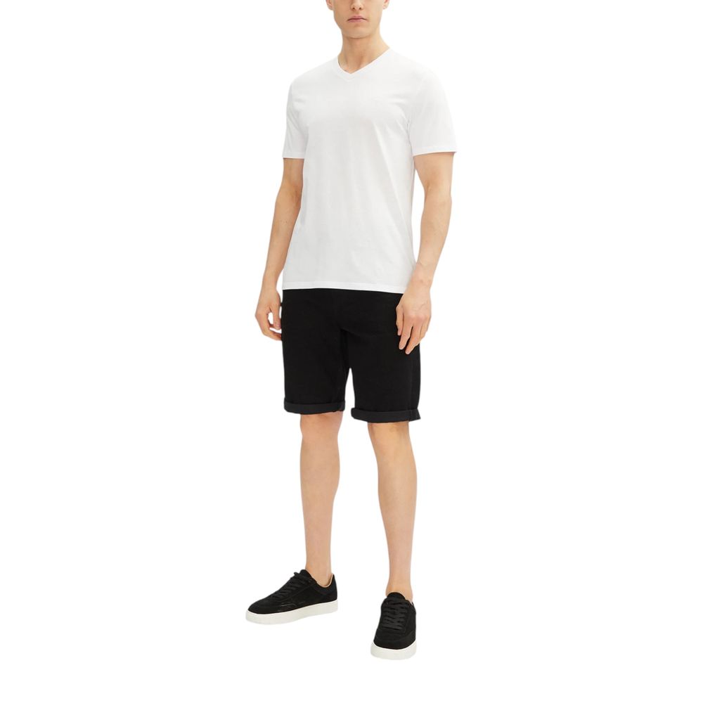 Calvin Klein Jeans Black Cotton Bermuda Shorts worn by a model, showcasing slim fit style.