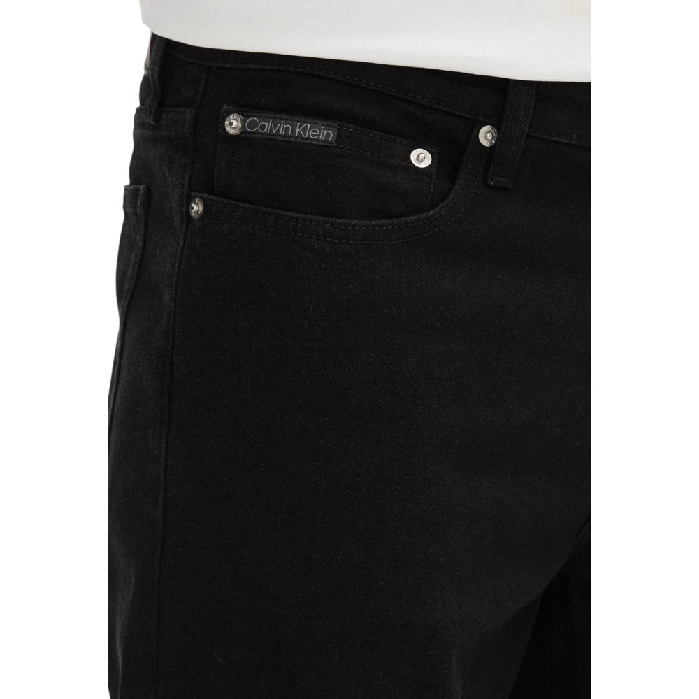 Close-up of Calvin Klein Jeans Black Cotton Bermuda Shorts highlighting slim fit and pocket details.