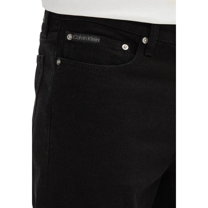Close-up of Calvin Klein Jeans Black Cotton Bermuda Shorts highlighting slim fit and pocket details.