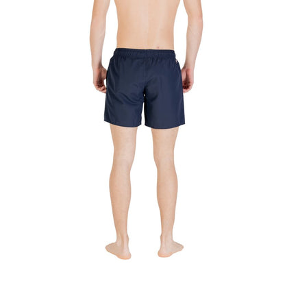 Back view of Colmar Originals Blue Polyester Swim Shorts with adjustable waistband, showcasing ergonomic fit and sporty design.