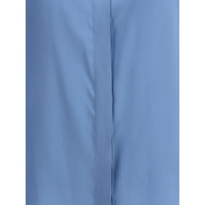 Close-up of Crida Milano Light Blue Silk Shirt showcasing smooth luminous satin texture and minimalist design.