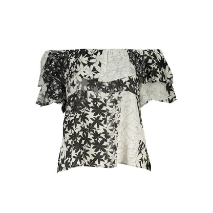 Black and white floral off-shoulder top with layered fabric design.