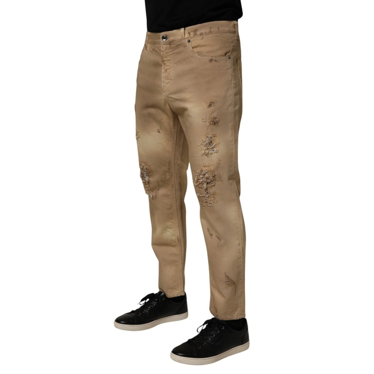Dolce & Gabbana Beige Cotton Loose Tattered Men Denim Jeans with distressed design and relaxed fit for modern streetwear style