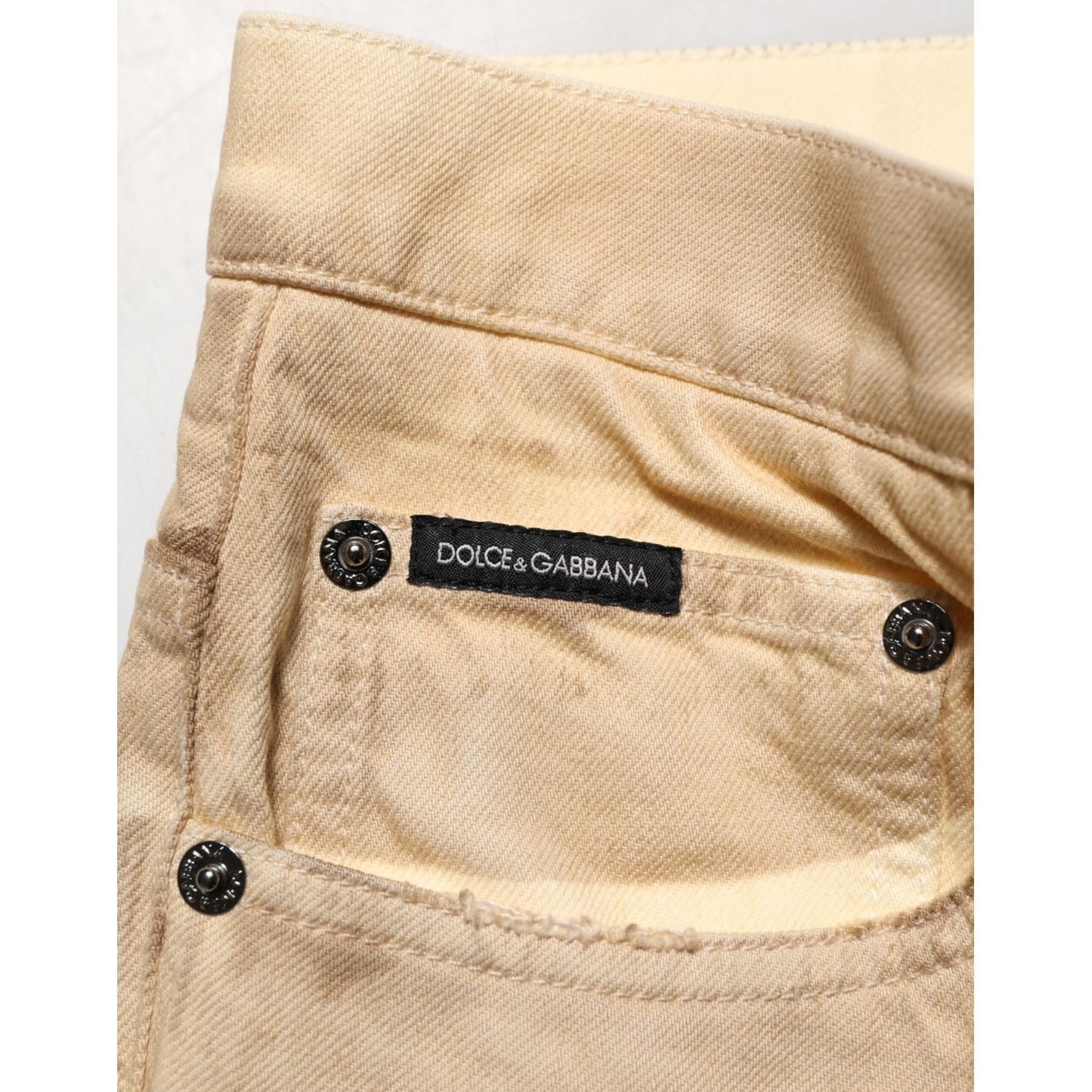 Dolce & Gabbana Beige Cotton Loose Tattered Men Denim Jeans with brand label on pocket