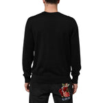 Back view of Dolce & Gabbana Black Cashmere Cherub Print Baroque Sweater, showcasing Italian craftsmanship.