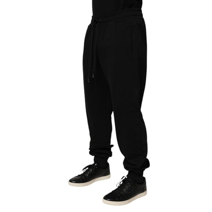 Dolce & Gabbana Black Cotton Drawstring Logo Sweatpants Pants with ribbed hems and logo patch, luxury casualwear.