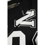 Dolce & Gabbana Black Cotton Letter Print Short Sleeve T-shirt with white varsity-style logo lettering, close-up view.