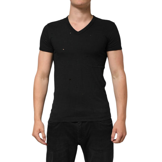 Dolce & Gabbana Black Cotton Tattered Logo V-Neck Men T-shirt with punched-hole design, worn by model, front view.