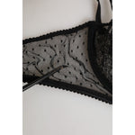 Close-up of Dolce & Gabbana Black Floral Underwired Balconette Bra Underwear mesh detailing with lace accents and black trim.