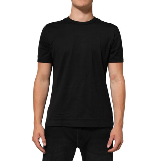 Model wearing Dolce & Gabbana Black Goodluck 2021 Cotton Crew Neck T-shirt, short sleeves, premium cotton fabric, regular fit, black color.
