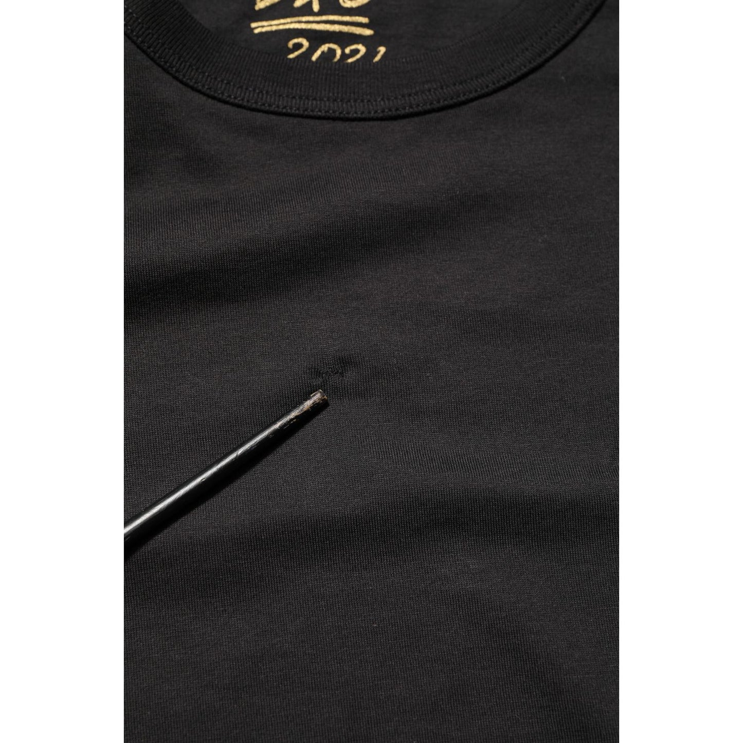 Close-up of Dolce & Gabbana Black Goodluck 2021 Cotton Crew Neck T-shirt showing fabric detailing.