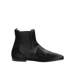 Dolce & Gabbana Black Leather Fur Men CHELSEA Boots Shoes with elastic side panels and plush fur lining, side view.