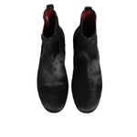 Top view of Dolce & Gabbana Black Leather Fur Men CHELSEA Boots Shoes with plush fur lining and classic design.