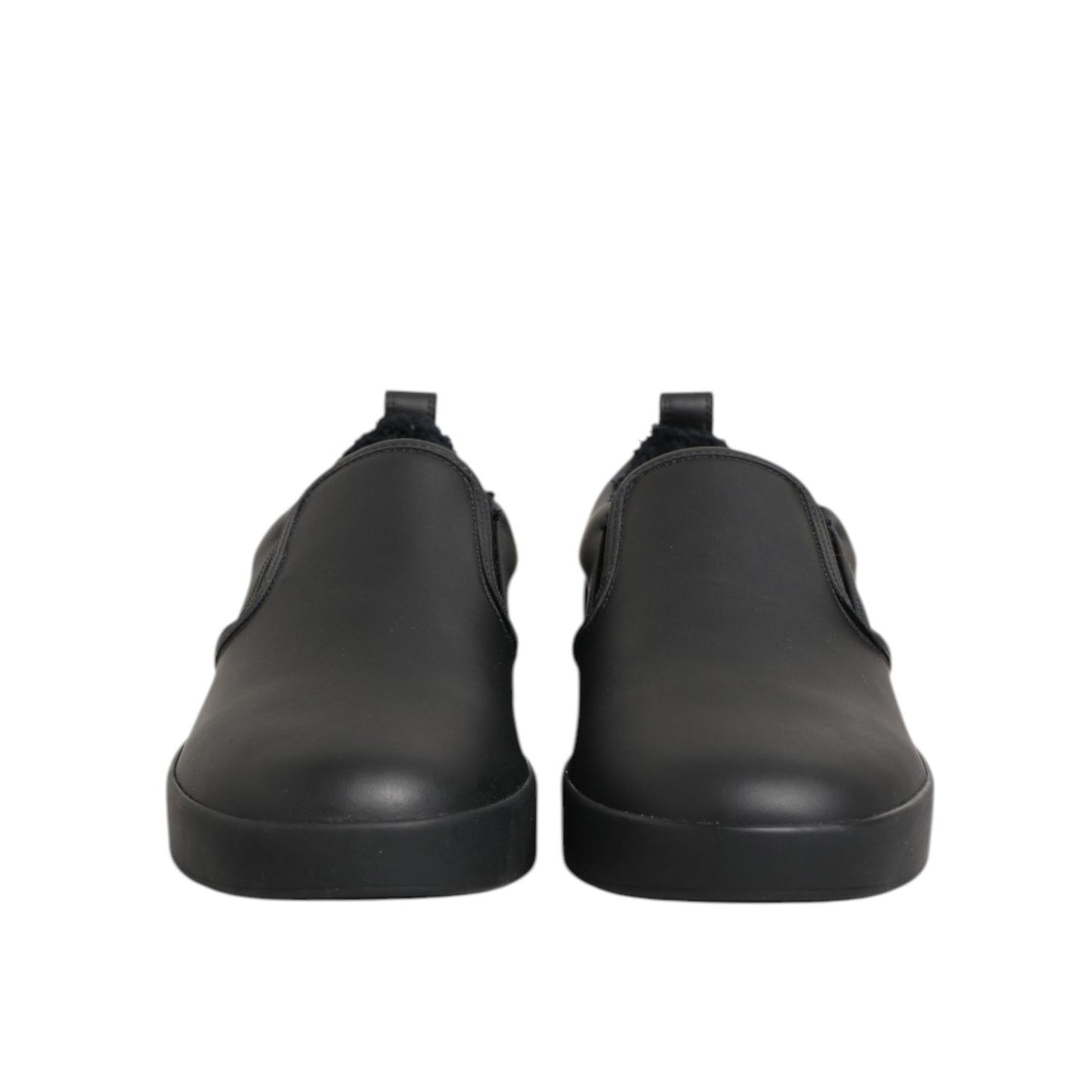 Front view of Dolce & Gabbana Black Leather Low Top Slip On Sneakers Shoes with polished finish and rubber sole.