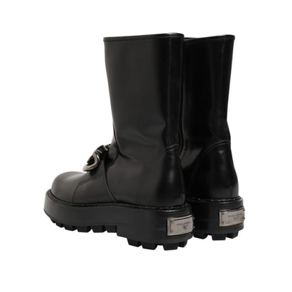 Dolce & Gabbana Black Logo Plaque Mid Calf Biker Boots Shoes with sturdy sole and structured silhouette, rear view.