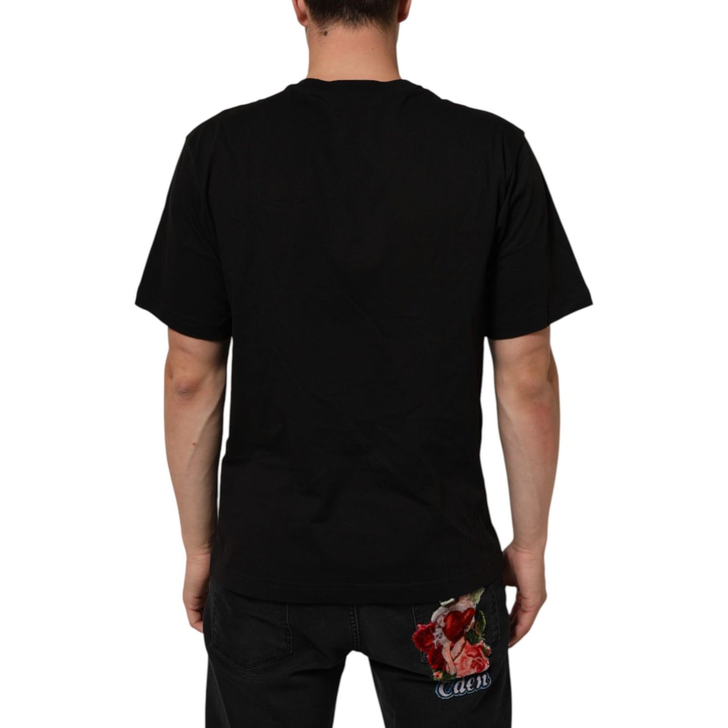 Back view of Dolce & Gabbana Black Logo Print Cotton Crew Neck T-shirt worn by a model, featuring short sleeves and premium cotton fabric.