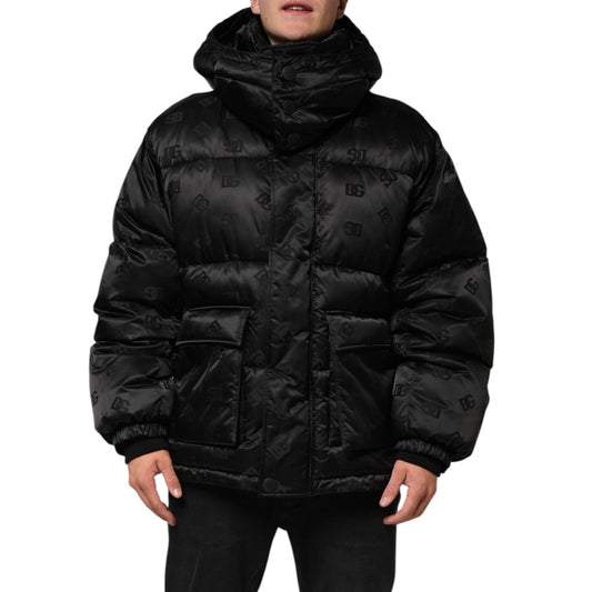 Dolce & Gabbana Black Monogram Logo Puffer Nylon Hooded Jacket with subtle DG pattern, showcasing front zip and storm flap.