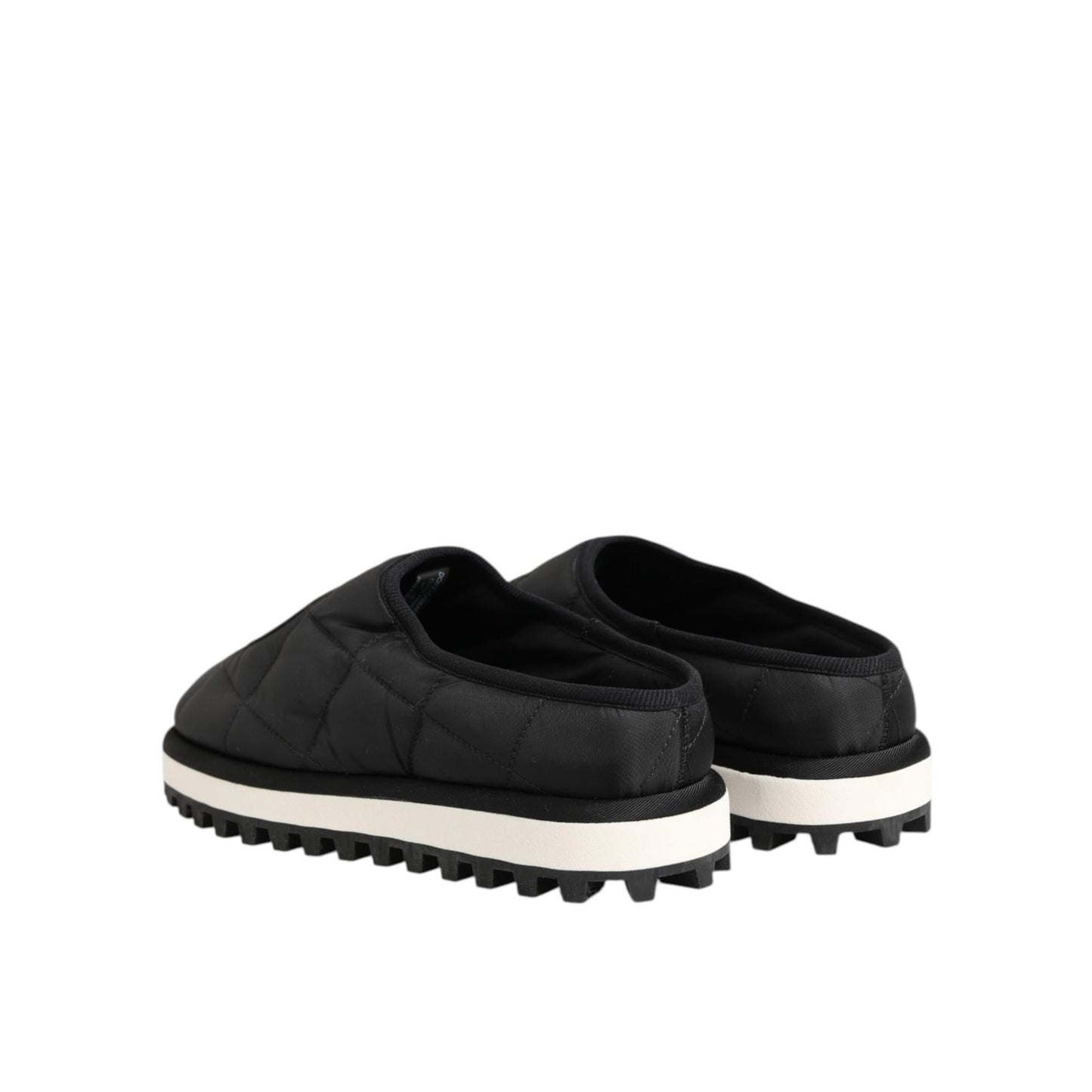 Dolce & Gabbana Black Nylon Low Top Slip On Sneaker Shoes with white soles, rear view of two shoes on a white background.