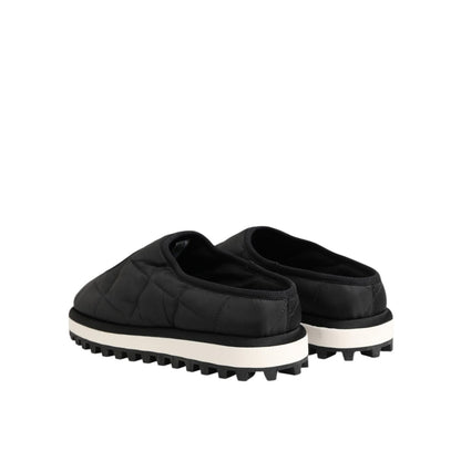 Dolce & Gabbana Black Nylon Low Top Slip On Sneaker Shoes with white soles, rear view of two shoes on a white background.