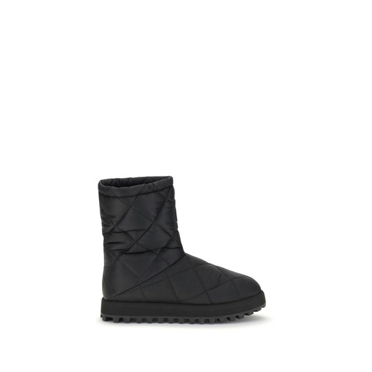 Dolce & Gabbana Black Polyamide Flat Boots with diamond quilted pattern and rubber lug sole for grip and durability.