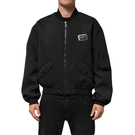 Dolce & Gabbana Black Polyester Logo Plaque Bomber Jacket with metal logo plaque and zip closure, front and sleeve pockets.