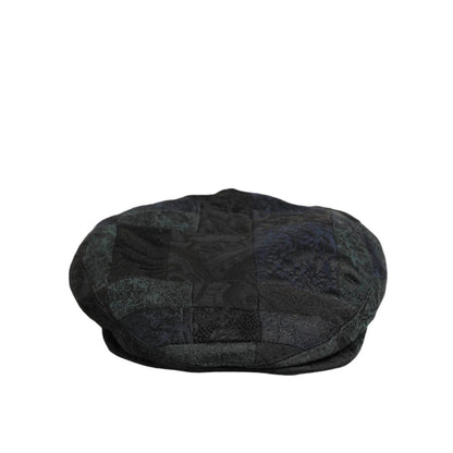 Dolce & Gabbana Black Polyester Newsboy Men Cloth Capello Hat with classic eight-panel design and timeless style.