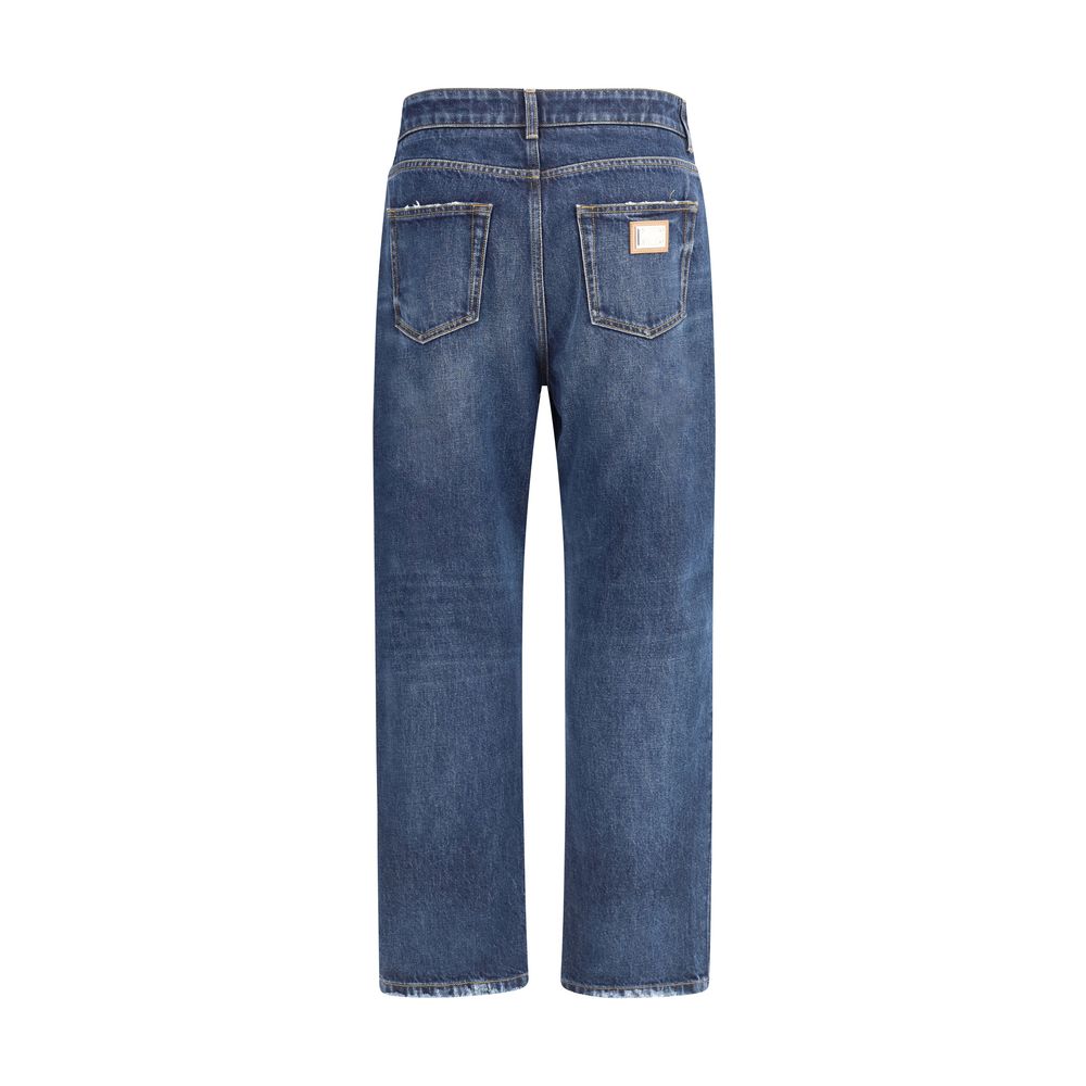 Dolce & Gabbana Blue Cotton Boyfriend Jeans with high waist, logo plaque, and classic five-pocket design, ideal for urban casual style.