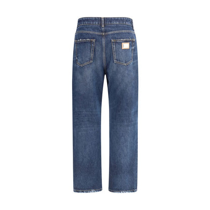 Dolce & Gabbana Blue Cotton Boyfriend Jeans with high waist, logo plaque, and classic five-pocket design, ideal for urban casual style.