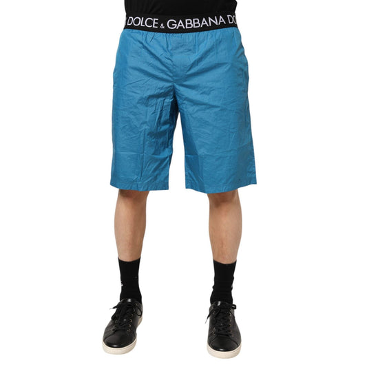 Dolce & Gabbana Blue Logo Waistband Beachwear Shorts Swimwear, featuring elastic waistband with logo, vibrant blue summer shorts.