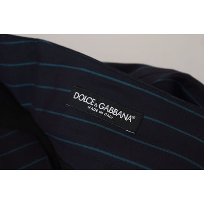 Dolce & Gabbana Blue Striped Men Formal Pants label, made in Italy, showing logo and striped pattern, 100% virgin wool fabric.