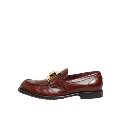 Dolce & Gabbana Brown Leather Logo Slip On Men Dress Shoes with sleek silhouette and gold logo detail, side view
