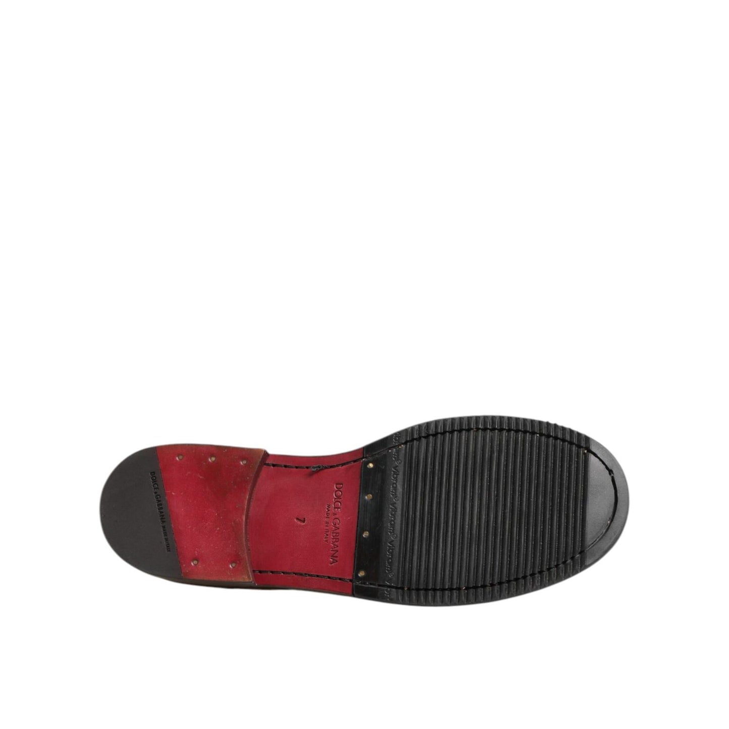 Sole of Dolce & Gabbana Brown Leather Logo Slip On Men Dress Shoes, showcasing grip and craftsmanship.