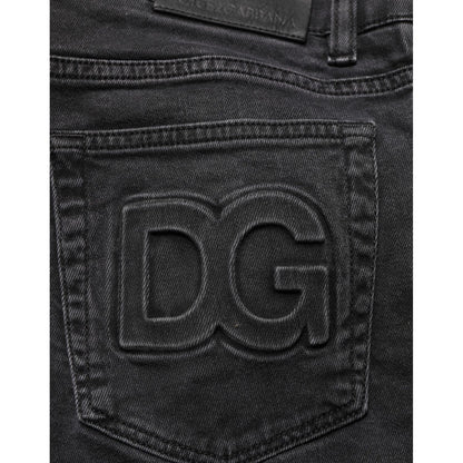Back pocket detail of Dolce & Gabbana Dark Gray Cotton Stretch Denim Trouser Jeans with embossed DG logo.