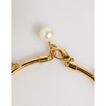 Dolce & Gabbana Gold Brass Faux Pearl Crystal Statement Luxury Jewelry Necklace with lobster clasp and pearl detail.
