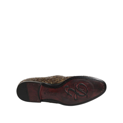 Bottom view of Dolce & Gabbana Gold Sequined Slip On Loafers Men Dress Shoes with embossed logo on the sole.