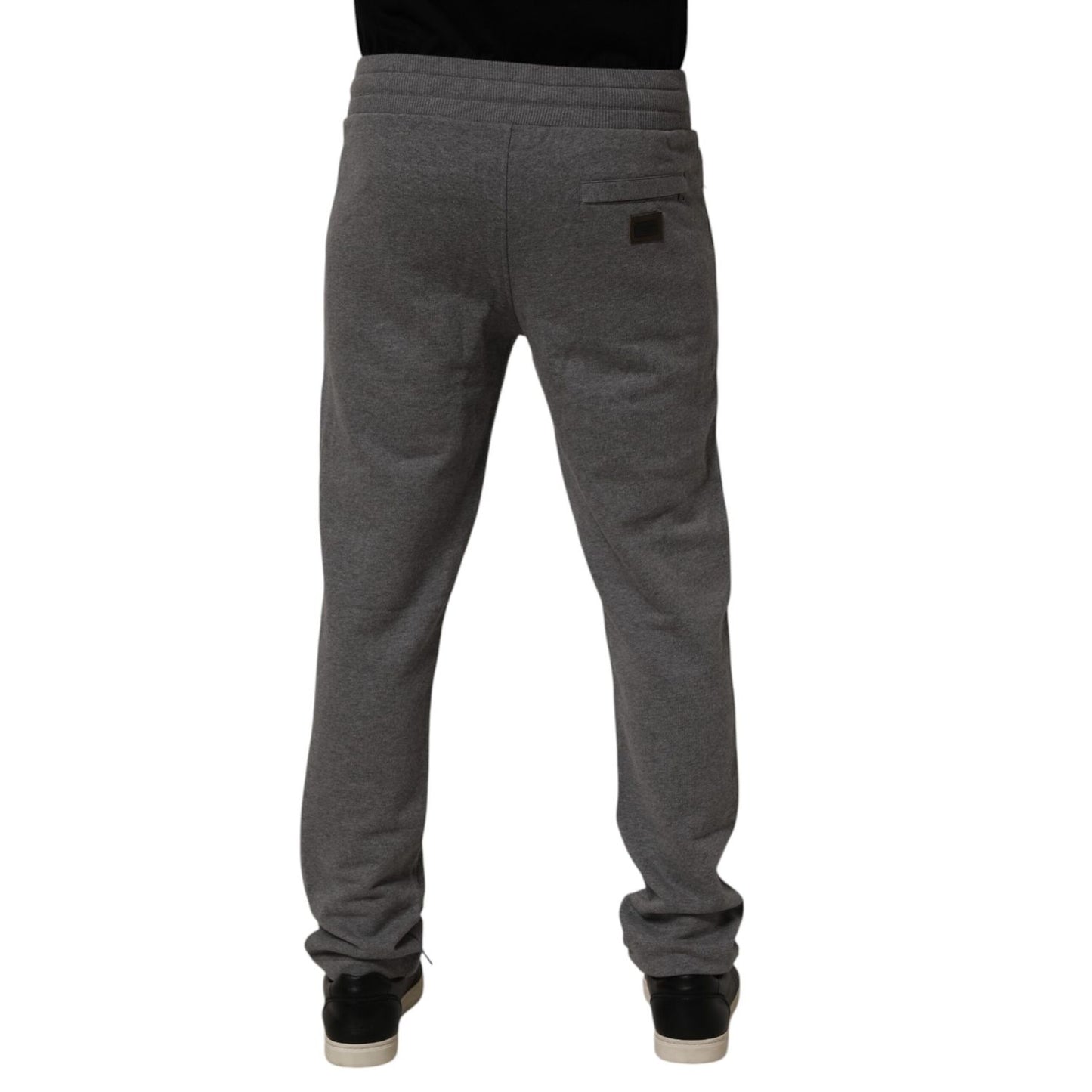 Back view of Dolce & Gabbana Gray Cotton Jogger Sweatpants Trouser Pants showcasing tapered fit and designer style.