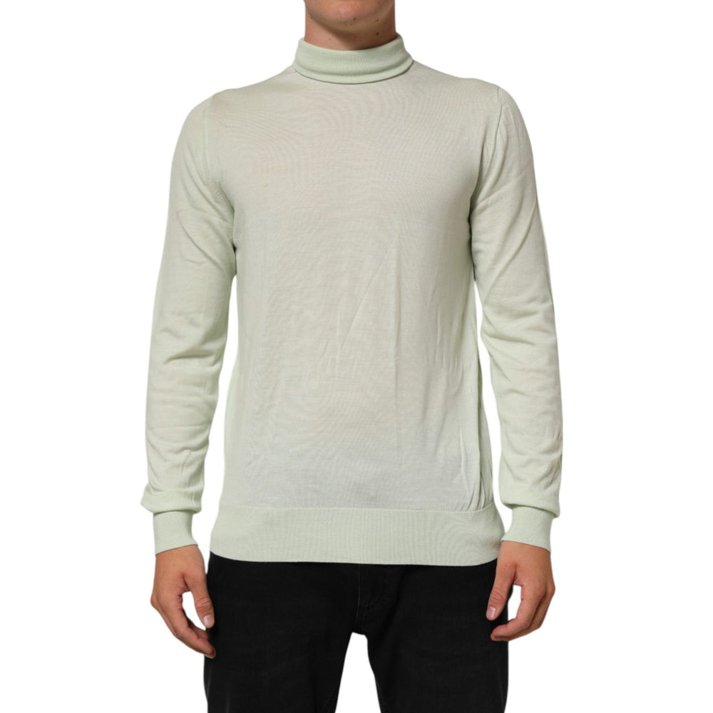 Dolce & Gabbana Light Green Logo TurtleNeck Pullover Sweater in 100% virgin wool with ribbed hem, perfect for layering in cooler weather.