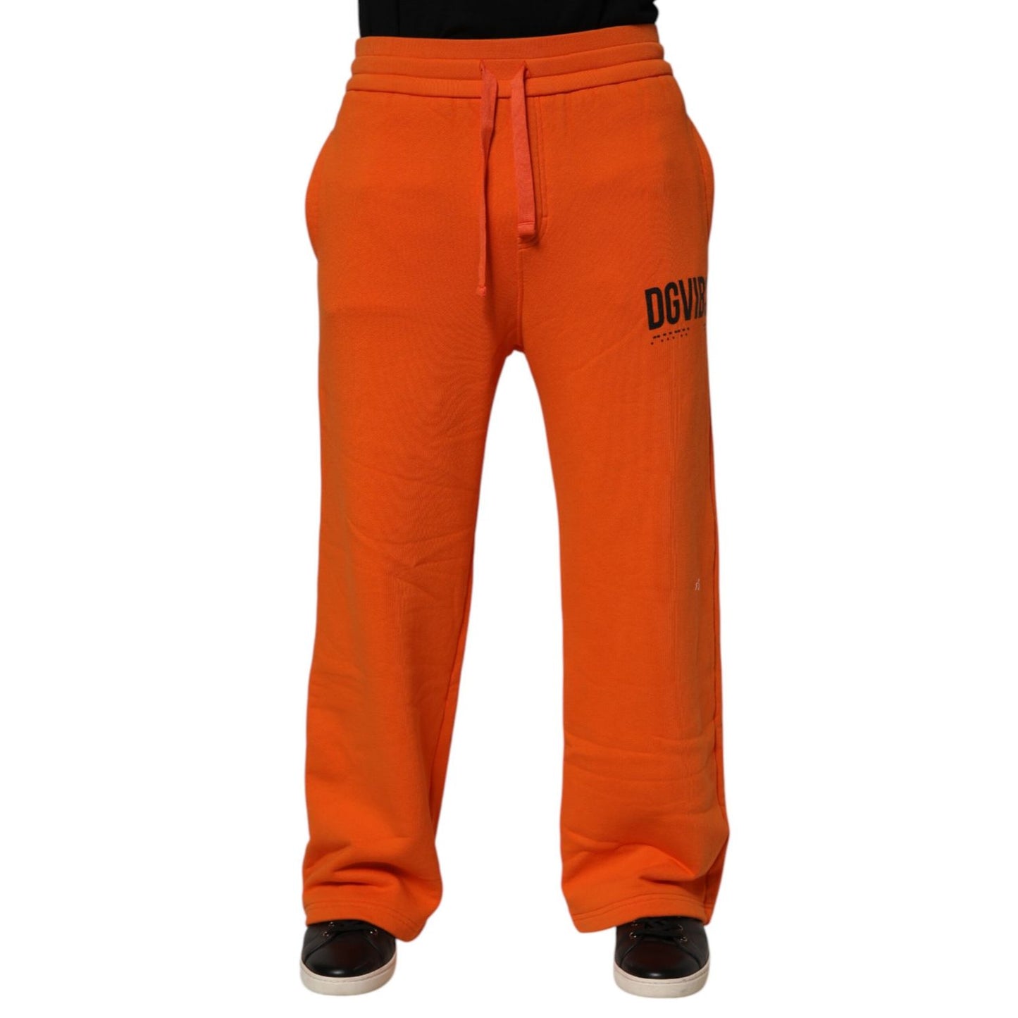 Dolce & Gabbana Orange Cotton DG VIB3 Logo Drawstring Sweatpants Pants for men, featuring elastic waistband, made in Italy.
