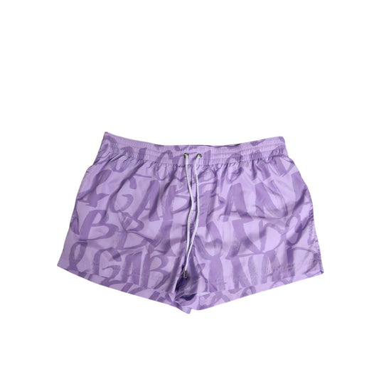 Dolce & Gabbana Purple DG Logo Print Nylon Men Shorts Swimwear with drawstring waistband.