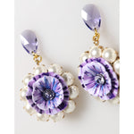 Dolce & Gabbana Purple Floral Crystal Pearl Drop Clip-On Statement Earrings with enamel flowers and pearls, close-up view.