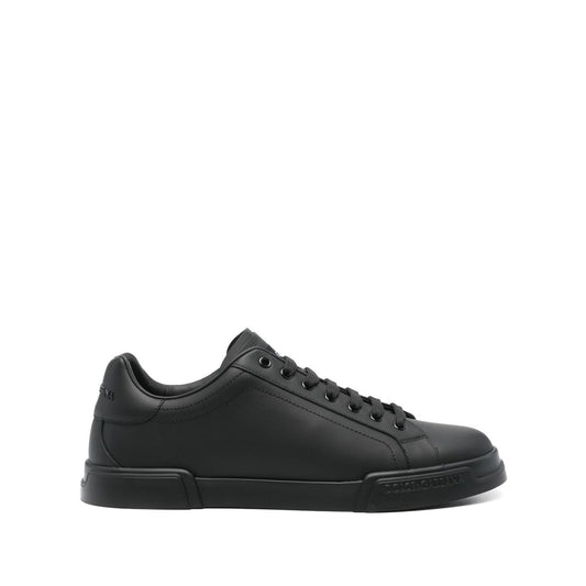 Dolce & Gabbana Sneakers Black, Portofino leather with black front lace-up fastening and flat rubber sole.
