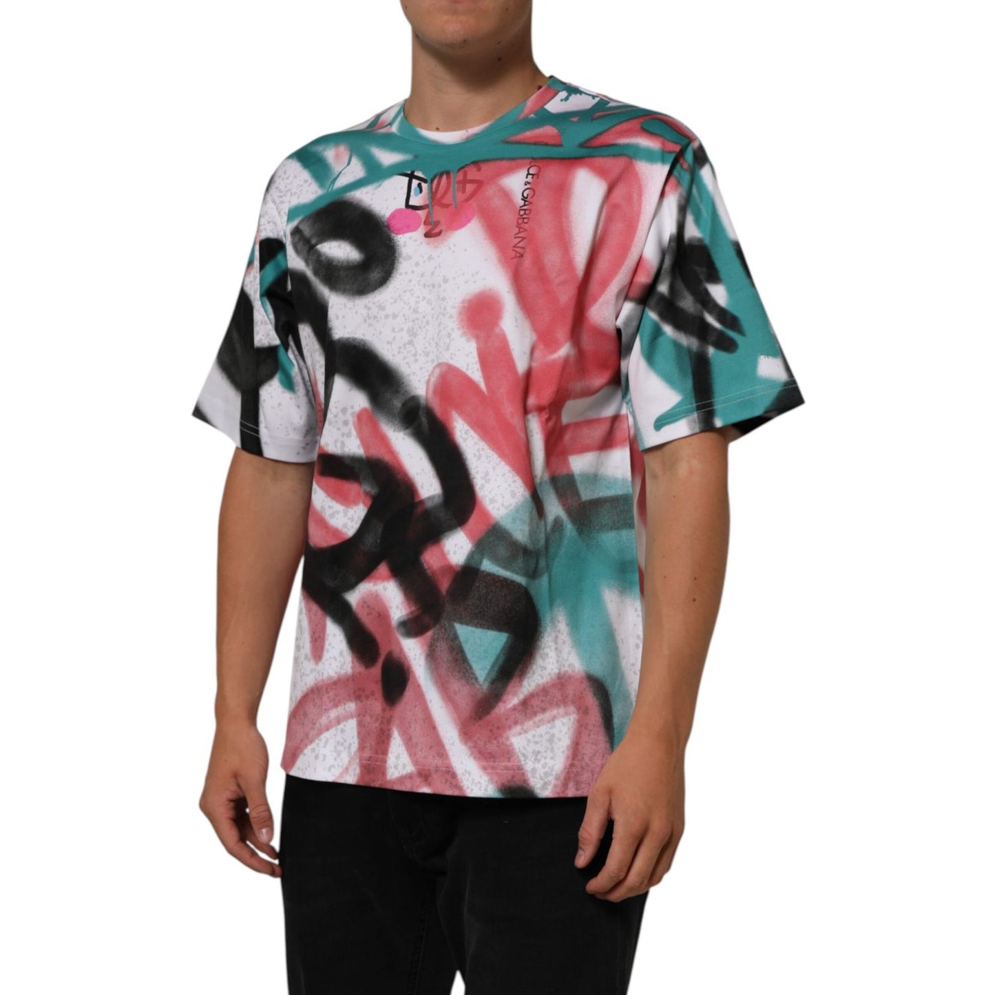Dolce & Gabbana White Graffiti Crew Neck Short Sleeves T-shirt featuring urban graffiti design, worn by a model, made from 100% cotton.
