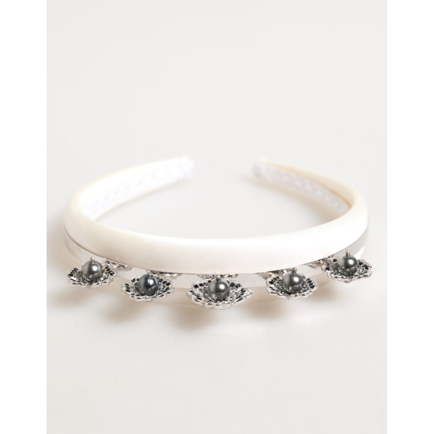 Dolce & Gabbana White Satin Palladium Silver Floral Crown Tiara Headband with pearls and crystals on display