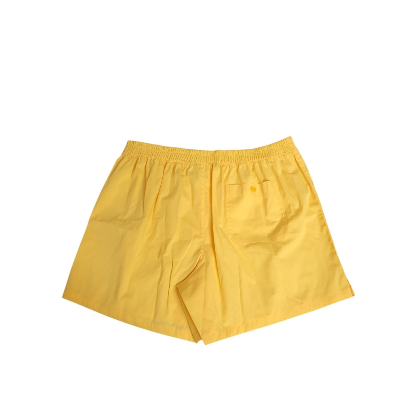Dolce & Gabbana Yellow Cotton Elastic Waistband Short Swimwear with button detail, comfortable fit, and logo, made in Italy.