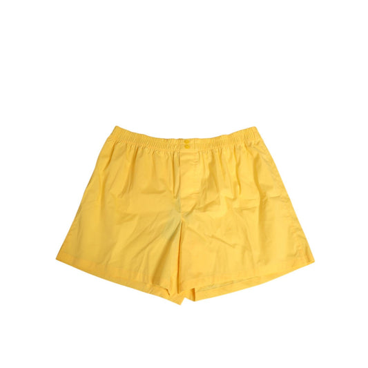 Dolce & Gabbana Yellow Cotton Elastic Waistband Short Swimwear with button closure and logo detail, made in Italy.