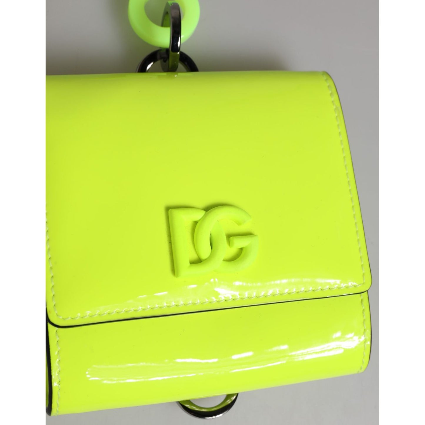 Dolce & Gabbana Yellow Green Bifold DG Logo Neck Strap Cardholder Wallet with embossed DG logo and magnetic closure.