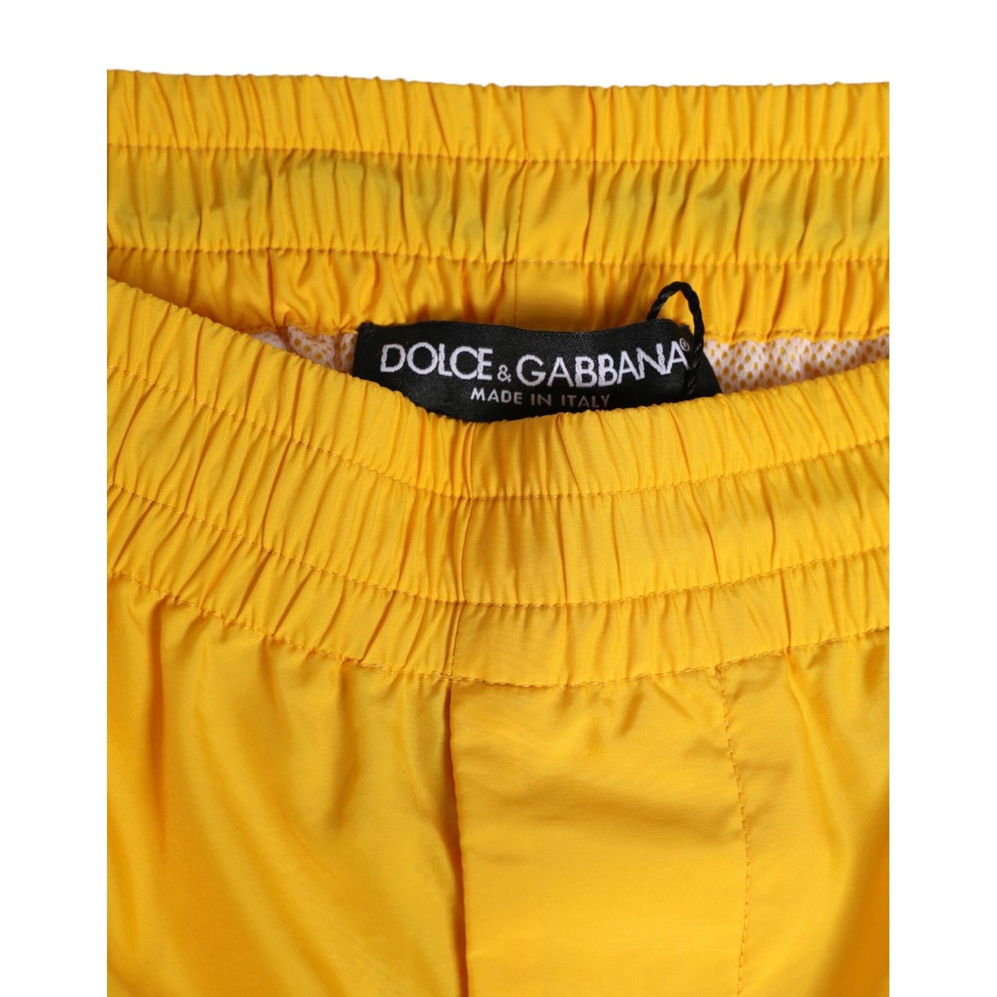 Dolce & Gabbana Yellow Nylon Logo Plaque Boxer Shorts Swimwear featuring elastic waistband with brand label.