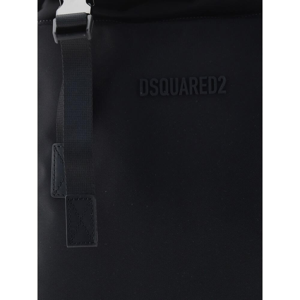 Close-up of Dsquared² Black Nylon Backpack with logo and metal clip detail.